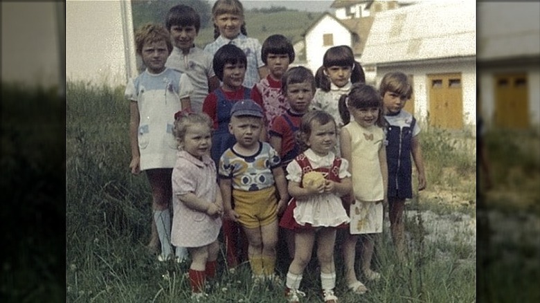 Young Melania Trump with children in Slovenia, second from right