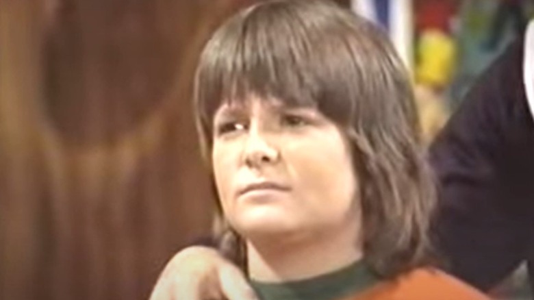 Michael J. Fox with long hair