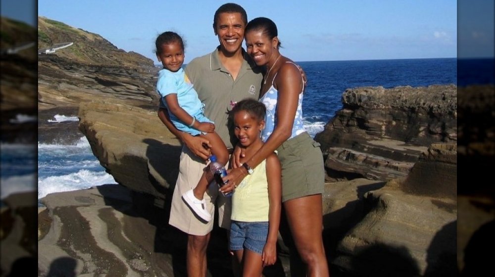 Sasha Obama, Barack Obama, Malia Obama, and Michelle Obama posing for a family photo on Instagram