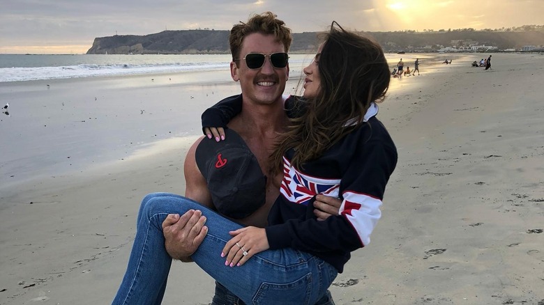 Keleigh and Miles posing on beach