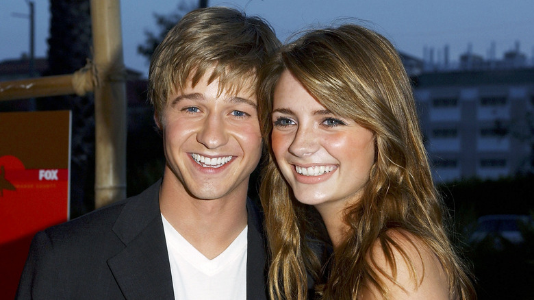 Mischa Barton, alongside Ben McKenzie in 2003, red carpet for "The O.C."