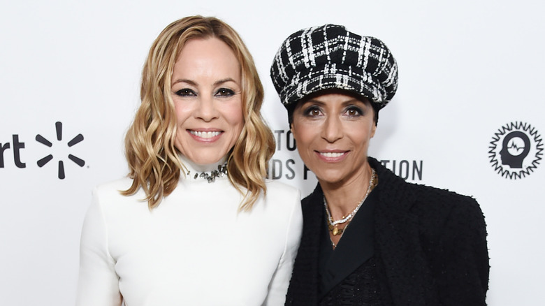 Maria Bello and Dominique Crenn at an event 