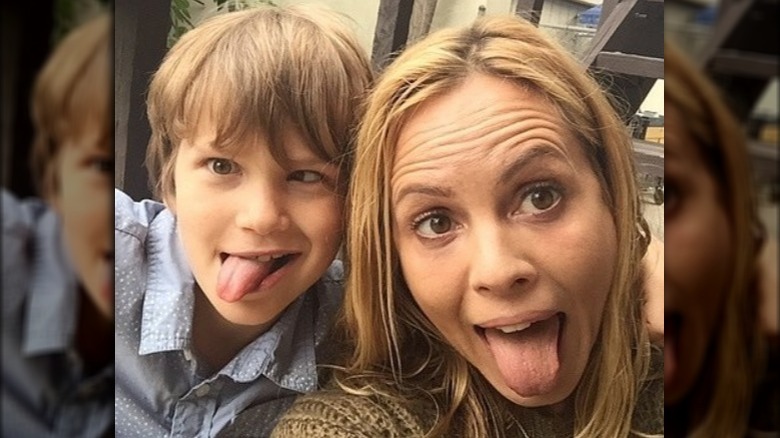 Maria Bello and Jackson McDermott at an event 