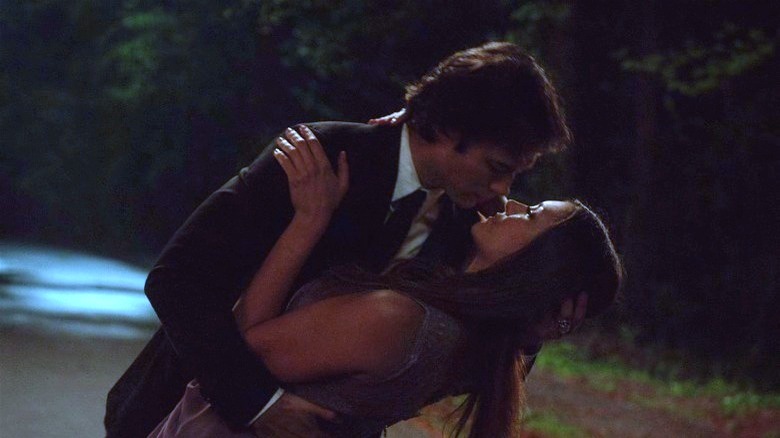 Damon dips Elena down for one last kiss