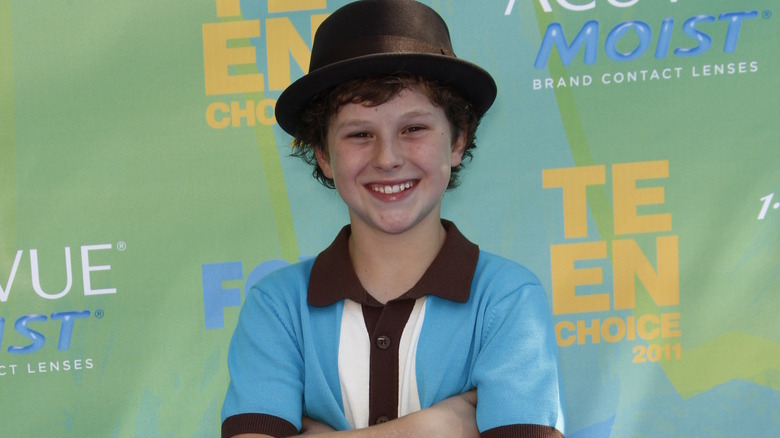 Nolan Gould wearing hat