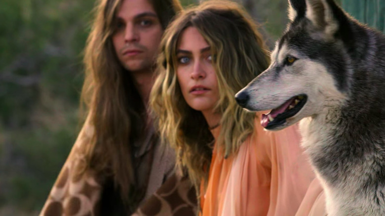 Paris Jackson and Gabriel Glenn posing with dog