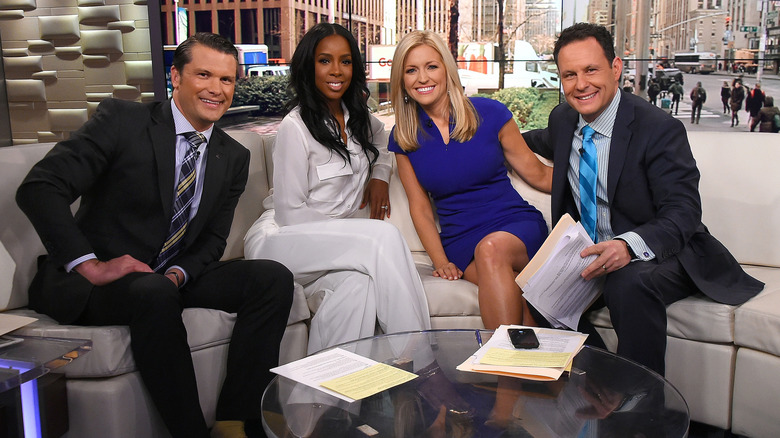 Pete Hegseth with singer Kelly Rowland, Ainsley Aarhardt, and Brian Kilmeade on the set of Fox & Friends