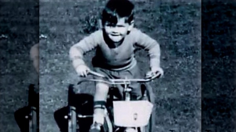 Pierce Brosnan as a child riding his bike