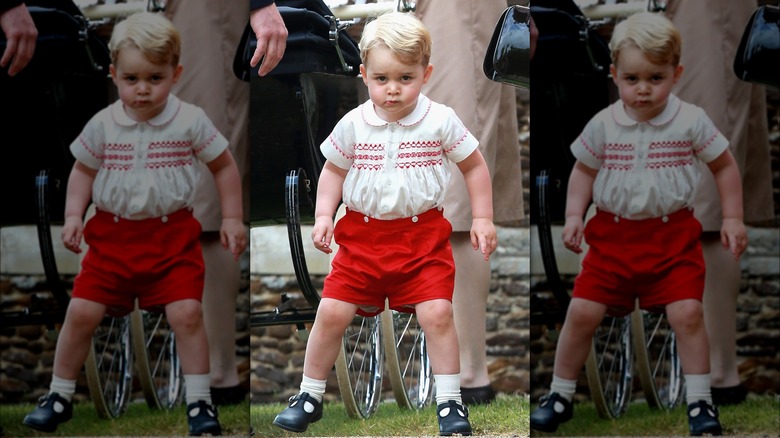 Prince George wearing red shorts