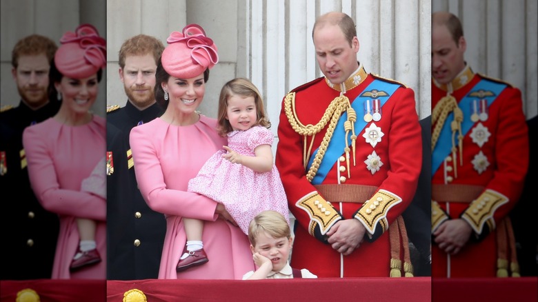 The Wales family behind balcony rail