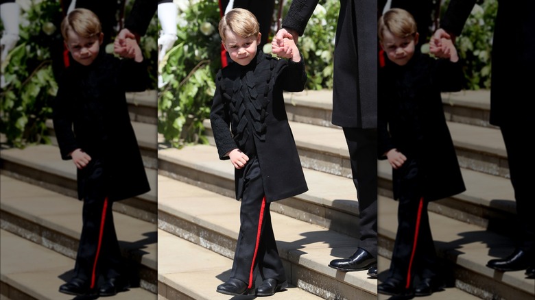 Prince George walking down steps