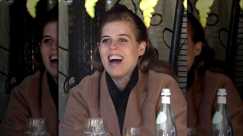 Princess Beatrice smiling with mouth open in May 2021