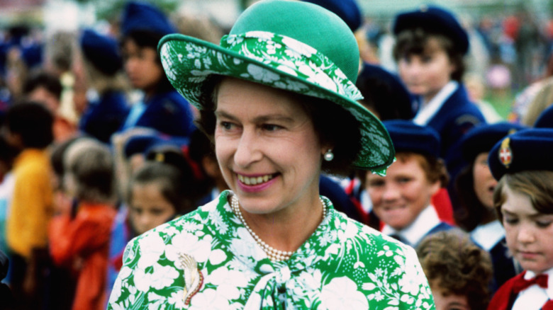 Queen Elizabeth greets children during her Silver Jubilee tour