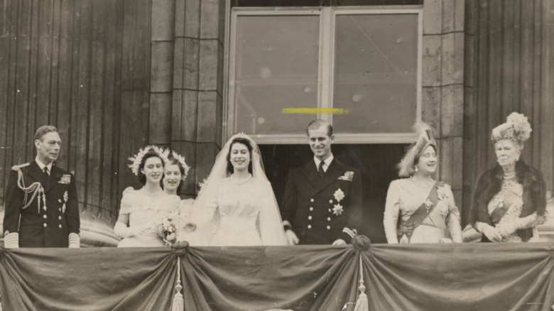 Queen Elizabeth poses next to Prince Philip on their wedding day