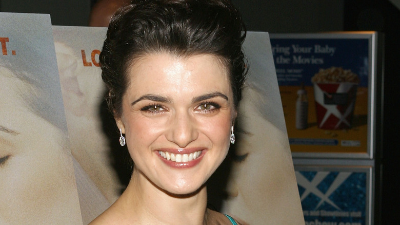 Rachel Weisz in front of the poster of 'The Constant Gardener.'