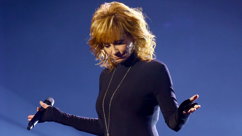 Reba McEntire with her head held down