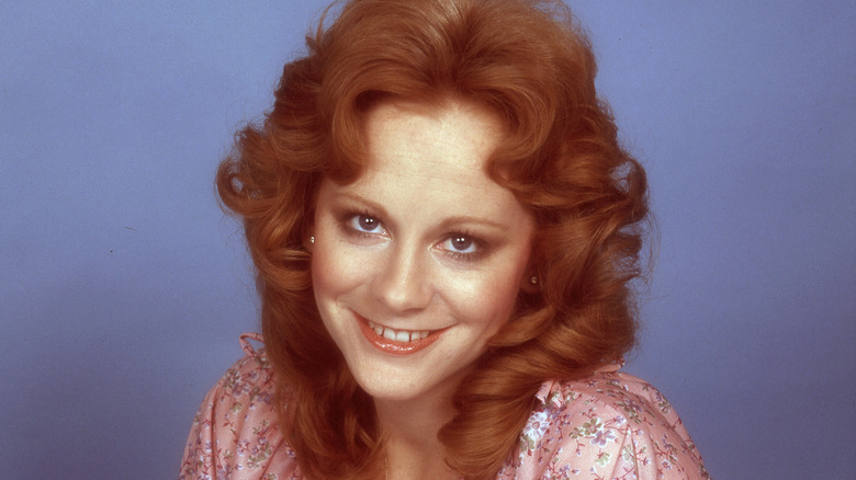 Reba McEntire smiling in glamour photo