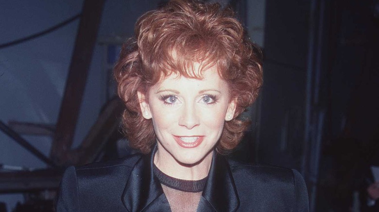 Reba McEntire wearing a blazer