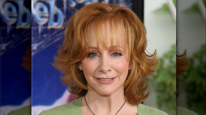 Reba McEntire in a green sweater