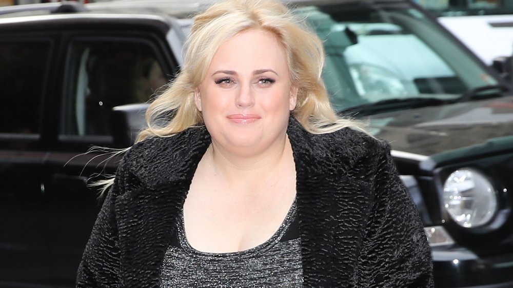 Rebel Wilson's hair blowing in a candid streetside snap 