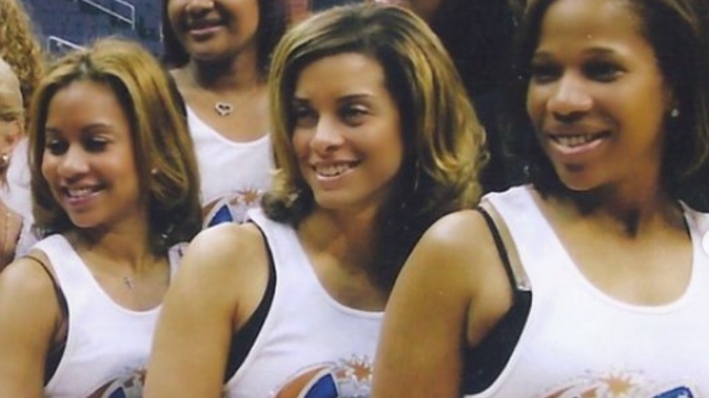 Robyn Dixon posing for a photo with Ione Rucker-Jamison (L) and Charrisse Jackson-Jordan (R) at 2005 Washington Wizards game.