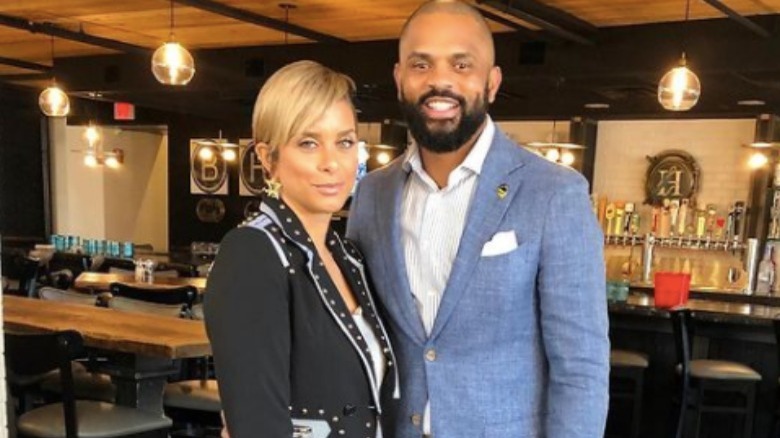 Robyn Dixon and Juan Dixon posing for a photo.