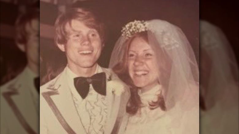 Ron and Cheryl Howard smiling on their wedding day