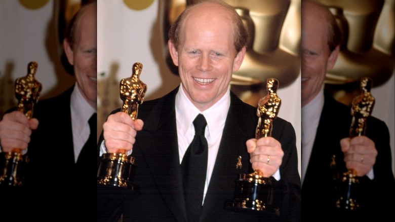 Ron Howard holds two Oscars