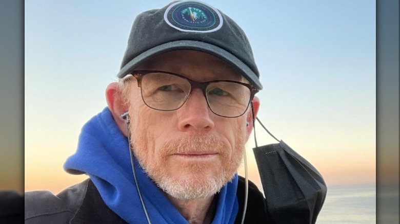 Ron Howard wearing a hat and glasses