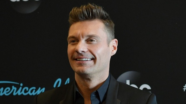 A closeup of Ryan Seacrest at the rebooted American Idol