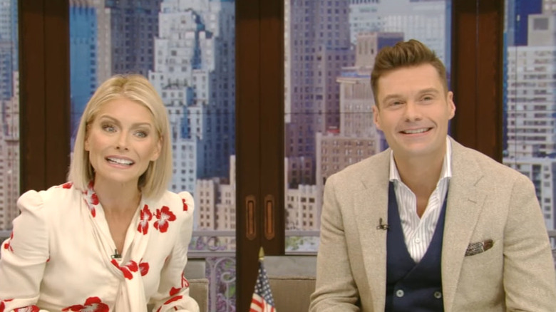 Kelly Ripa and Ryan Seacrest walk out on stage at Live!