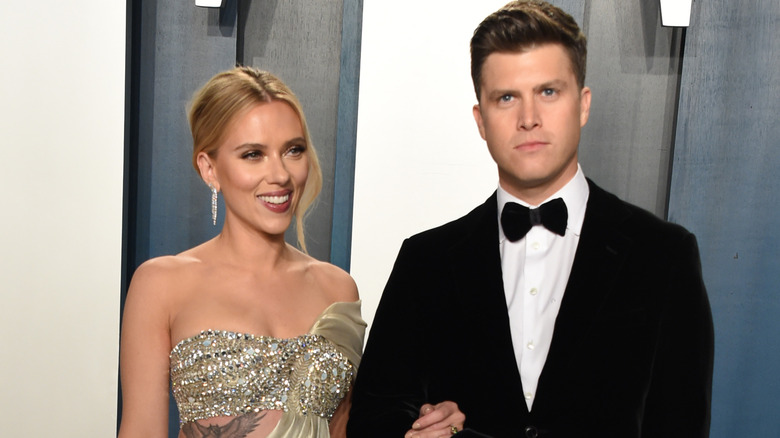 Scarlett Johansson poses with husband Colin Jost on red carpet