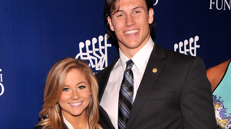 Shawn Johnson posing with Andrew East