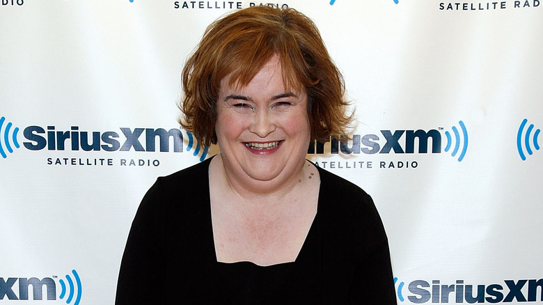 Susan Boyle smiling on the red carpet