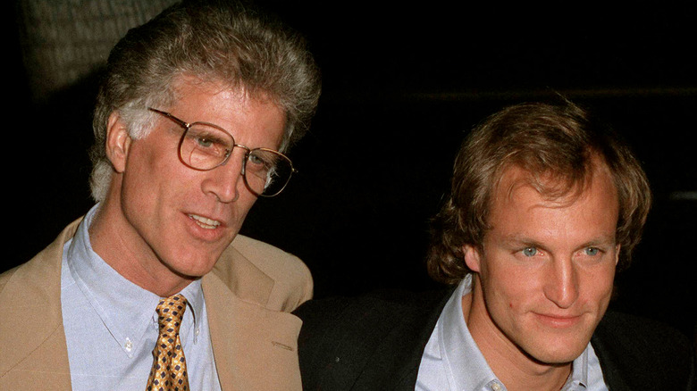 Ted Danson posing with smiling Woody Harrelson