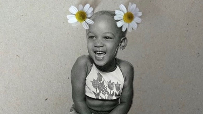 Tyra Banks as a baby, smiling