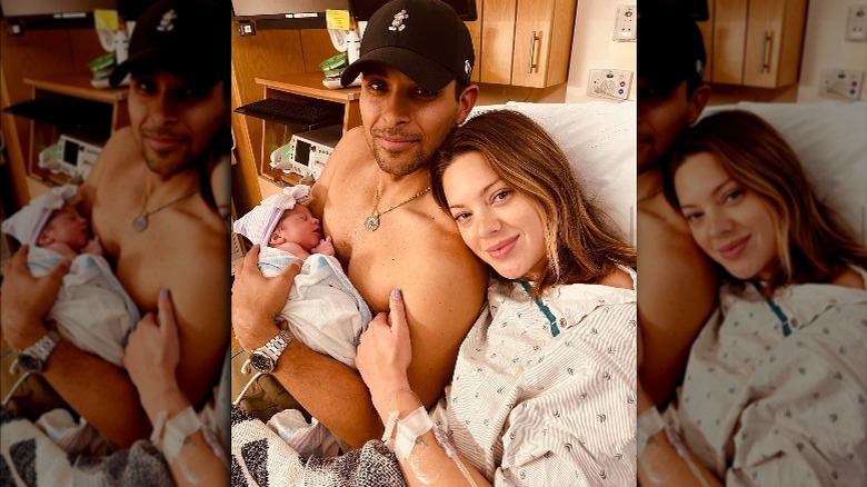 Wilmer Valderrama, holding his newborn at the hospital with Amanda Pacheco  