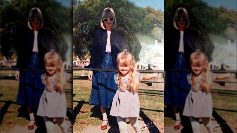 Yvonne Strahovski smiling as a child with her mother