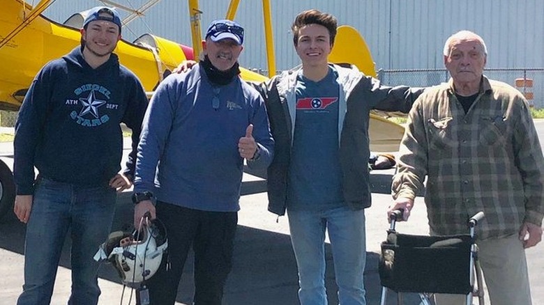 Aaron Tippin, his father, and two sons