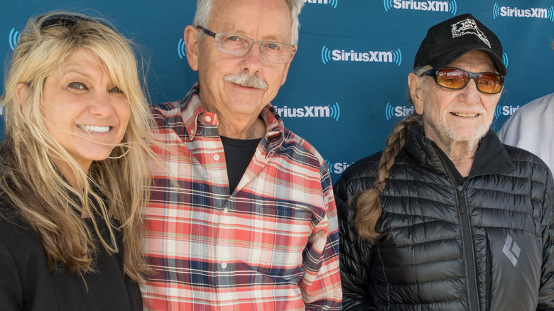 Willie Nelson and Paula Nelson posing with family