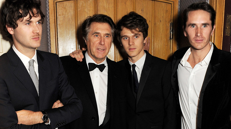 Bryan Ferry and his sons posing 