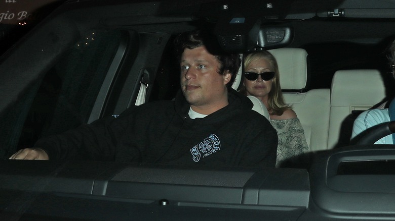 Conrad Hilton in a car