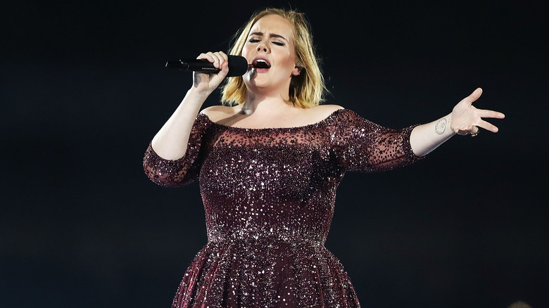 Adele performing onstage