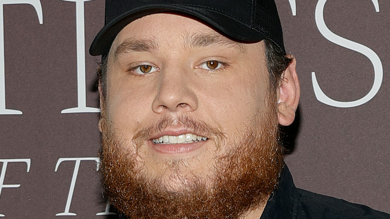 Luke Combs wearing a hat