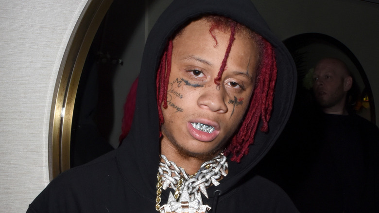 Trippie Redd showing his grillz