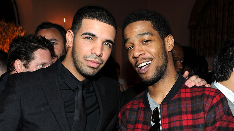 Drake and Kid Cudi posing