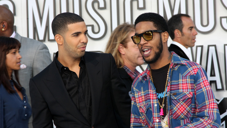 Drake and Kid Cudi posing