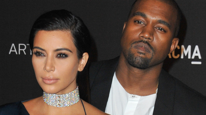 Kim Kardashian Kanye West smoldering red carpet