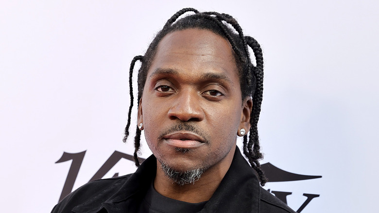 Pusha T braids smiling