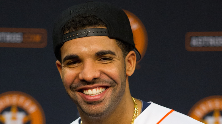 Drake wearing a Houston Astros jersey